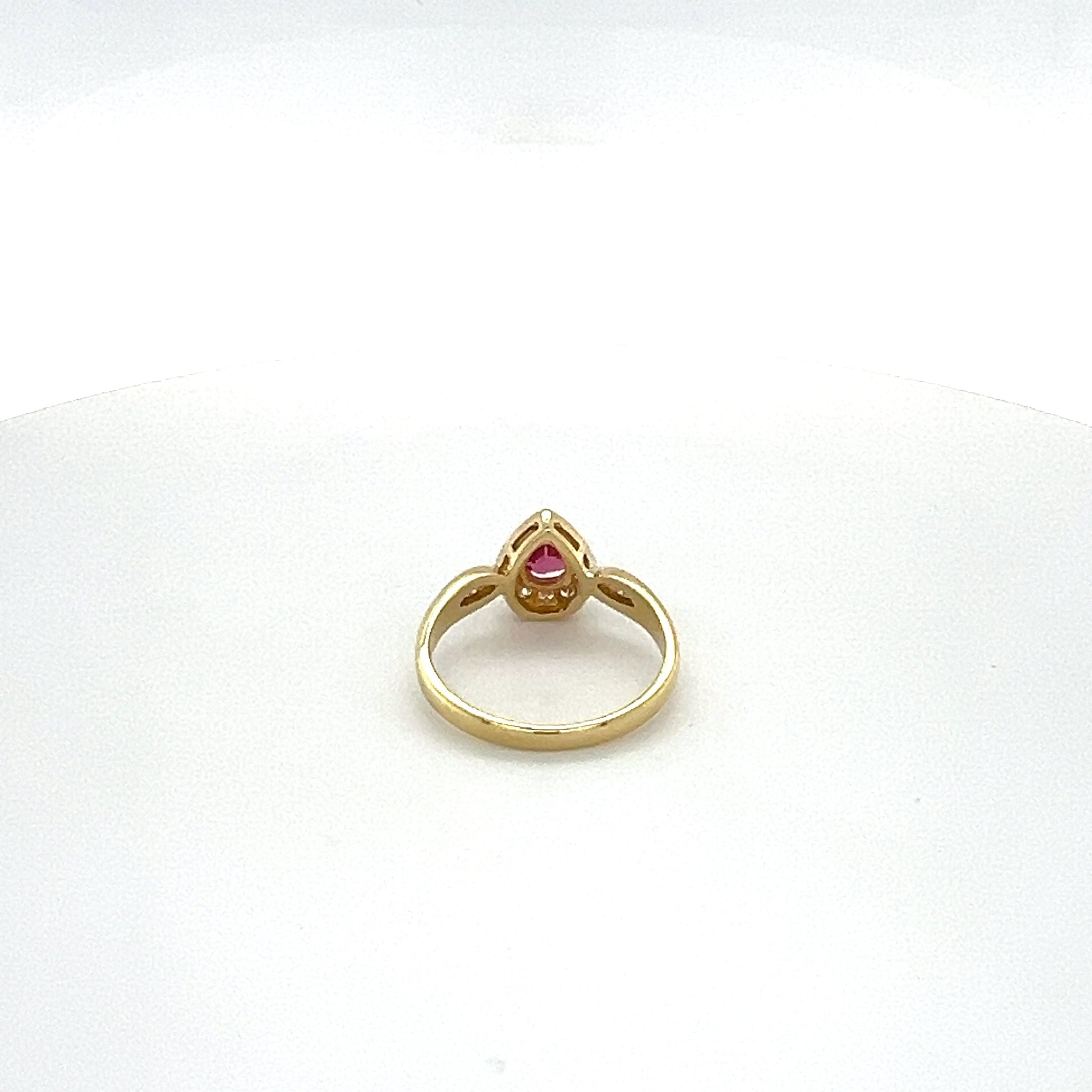PEARSHAPE RUBY AND DIAMOND RING