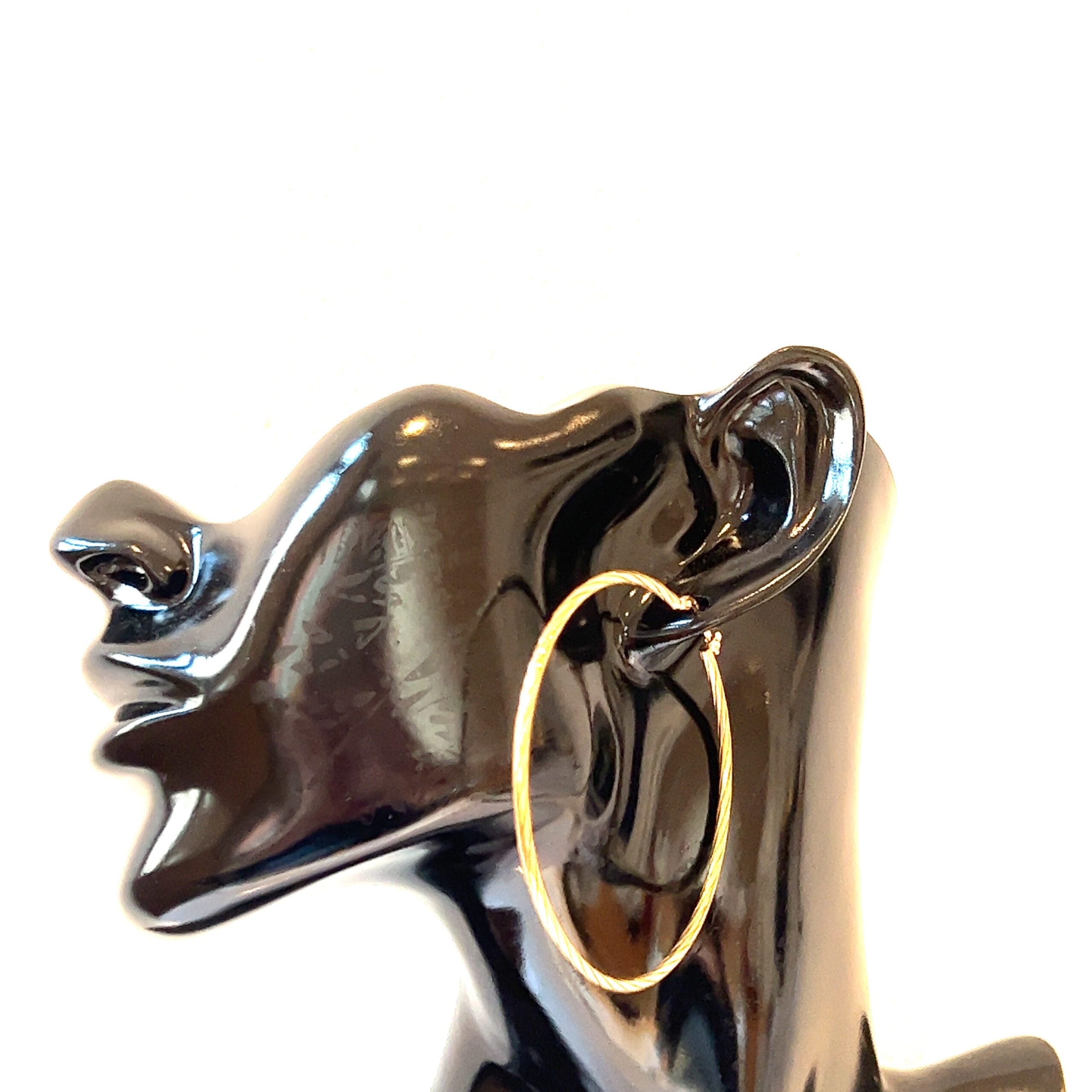 TWISTED BIG CURLED HOOPS