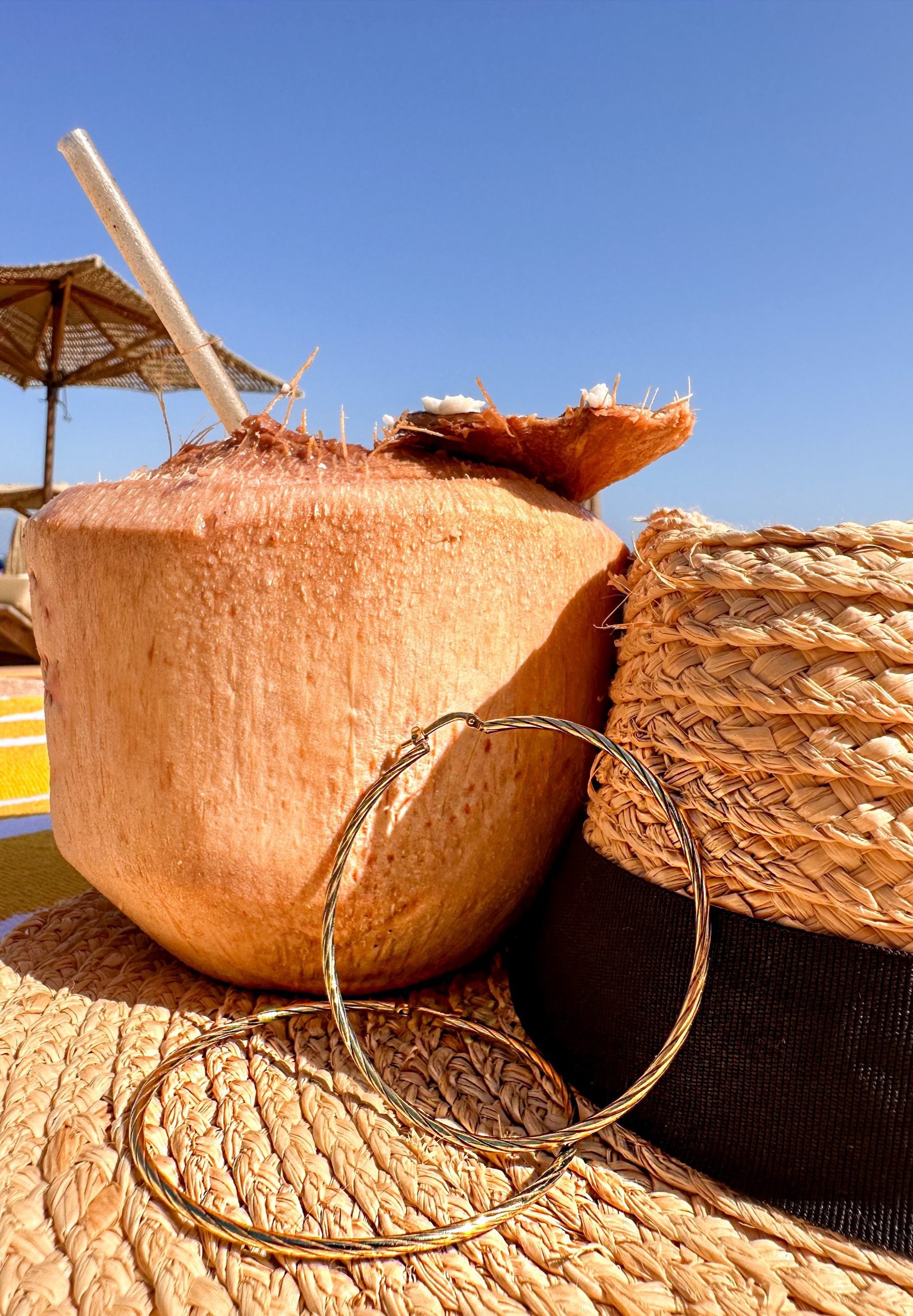 TWISTED BIG CURLED HOOPS